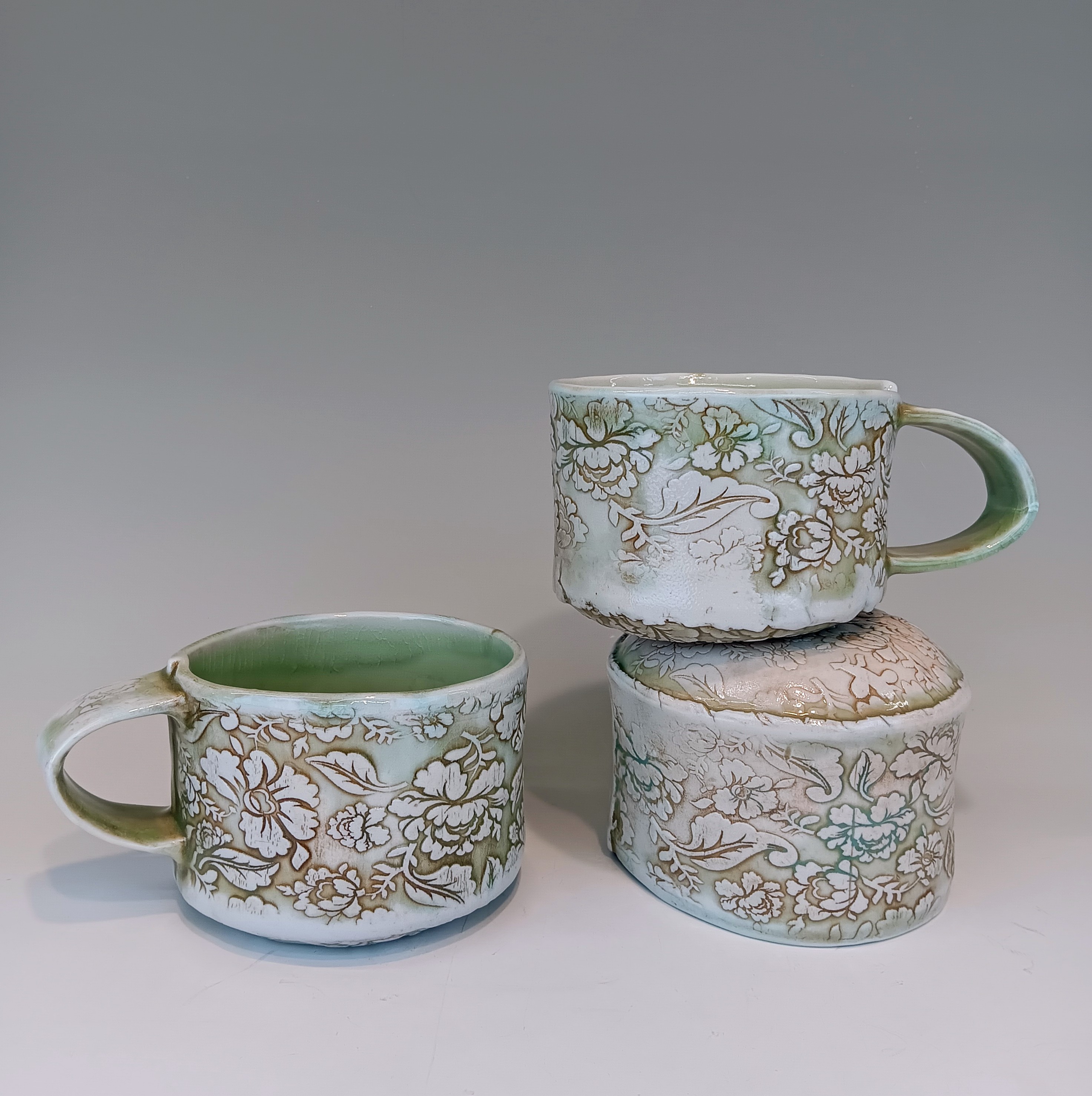 Pottery mugs created in Art class
